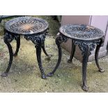 A pair of cast iron garden pot stands (originally chairs), each 44cmH