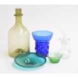 A green studio glass hand blown bottle, 23cmH, together with two similar dishes, an oil bottle