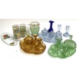 A quantity of vintage coloured glass to include 3 dressing table sets