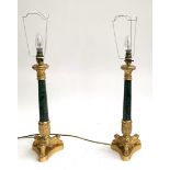 A pair of gilt metal and serpentine table lamps, with tasseled pleated silk shades, 74cmH to top