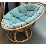 A bamboo papasan chair with cushion 116cmW