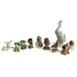 A quantity of bird figurines (af) to include 6 Beswick birds, namely goldfinch, wren, blue tit (