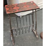 A wrought iron occasional table/magazine rack, with tiled top, 47x31x54cm