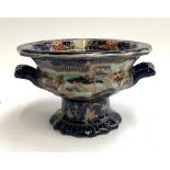 An Ironstone china planter with pagoda scenes on a cobalt ground, 17cmH