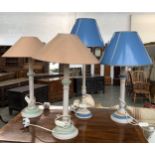 A pair of turned wood table lamps, painted, 53cmH; together with two similar