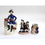 A Staffordshire flatback figurine of Napoleon, 39.5cmH, together with an Allerton's toby jug and a