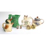 A mixed lot of ceramics to include Sylvac jug (af); Staffordshire flatback; novelty duck teapot etc