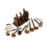A leather pipe stand, and a quantity of gentleman's pipes (12), to include several Dunhill Root