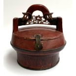 A Chinese red lacquered wooden rice bucket with pierced handle, 30cmH