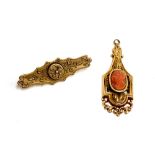 A 19th century Baroque revival gold and coral cameo pendant, tests as 14ct or higher, 2.7g, 5cmL;
