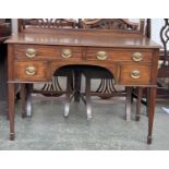 A Regency kneehole desk, moulded top over two frieze drawers, kneehole flanked by a further two