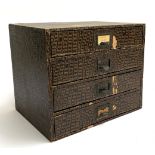 A vintage faux alligator four drawer desk organiser