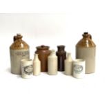 Two stoneware flagons, one Pickup & Co, Bristol, the other W. P. Stafford, Botanical Beverages,