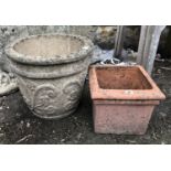 A composite stone planter, 30cmH, together with a terracotta square planter