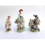 Three Derby porcelain figures, a continental lady and lamb, with encrusted floral detail, 20cmH, a