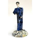 A vintage Dennis Chinaworks ceramic figurine modelled by Roger Mitchell 1985, suit by Japanese