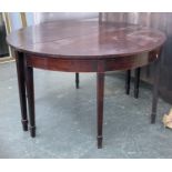 A George III D end mahogany dining table, the top refinished, with later additional leaf