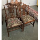 A set of four George III splatback dining chairs, on square tapered moulded legs