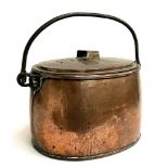 A large copper lidded pot with wrought iron swing handles, 51cmW