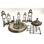 A mixed lot of plated and other metal items to include several trays, salt and pepper, miniature