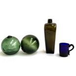 Two green glass fisherman's floats, together with a Bristol blue glass cup, 8cmH etc