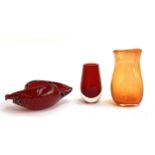 A red art glass bubble dish, 15cmW; a red glass vase; and a signed orange art glass vase, J