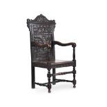 A Victorian carved and stained oak armchair in 17th century style circa 1890 124cm high