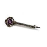 A Scottish silver kilt pin set with an amethyst, hallmarked for Ward Brothers, Edinburgh, 1957, 6.