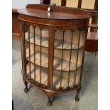 A reproduction bowfront glazed display cabinet, 106x45x122cmH