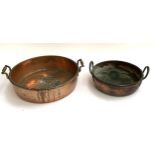 Two twin handled copper and brass pans, 45cmD and 33cmD