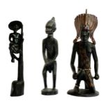 Three carved African tribal figures, the tallest 31.5cmH