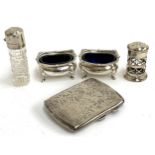 A silver cigarette case, Birmingham 1919, together with a pair of silver salts with blue glass