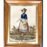 A needlework depicting a young lady, possibly Dutch, in a birds eye maple frame, 38x27.5cm