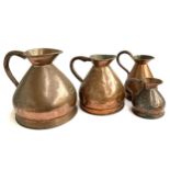 A set of four 19th century conical copper measures, 4 gallon, 2 gallon, gallon and half gallon,