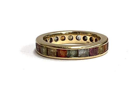 A 9ct gold and channel set multi-coloured topaz eternity ring, size N, approx. 4.2g - Image 1 of 3