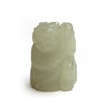 A small Chinese celadon jade figure of a boy holding a leafy lotus stem, 2.7cmH, with central