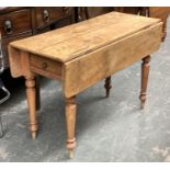 A 19th century pine dropleaf table, on turned legs, 112x48x75cmH, when extended approx. 88cmW
