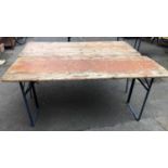 Two trestle tables, 180x76cm and 180x66cm