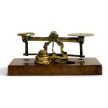 A set of 19th century brass postal scales with weights by S Mordan & Co, London