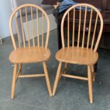 A matched pair of Ercol style hoopback kitchen chairs