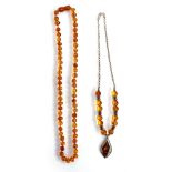 A baltic amber and 925 silver necklace, 47cmL; together with one other