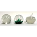 Three glass paperweights, one by Holmegaard, 7.5cmH, signed to base and dated 1960; one Caithness '