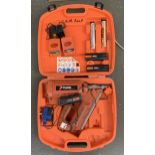 A Paslod nail gun impulse 350/90ct cased with accessories
