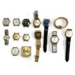 A mixed lot of various wristwatches and faces to include a Swatch automatic, Seiko, Corvette, Timex,