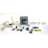 A quantity of glass items to include Murano glass sweets; crystal penguin figurine; glass swans etc