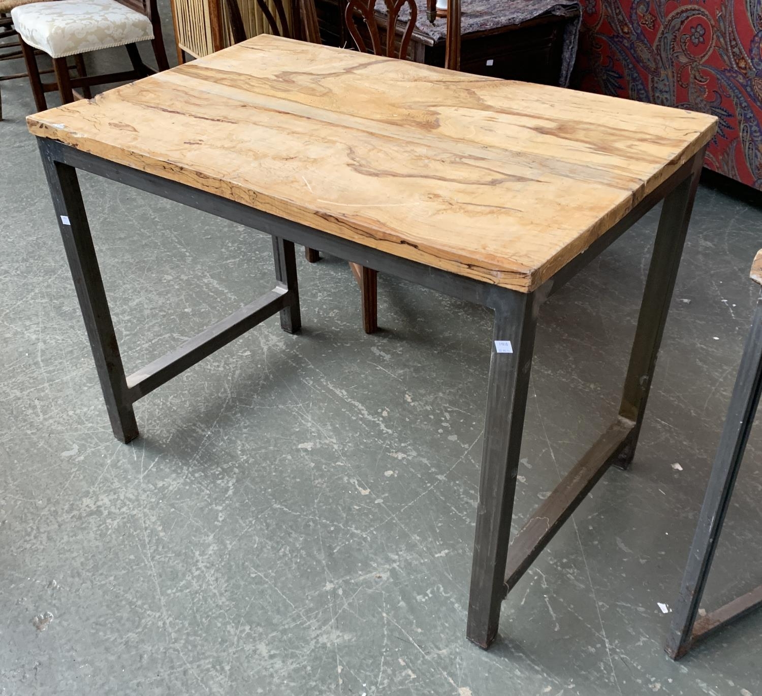 An industrial style square table, with solid spalted beech top, on fabricated steel base,