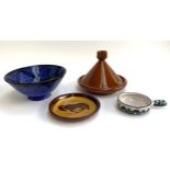 A glazed terracotta tagine pot together with a cobalt blue fruit bowl, 26.5cmD etc