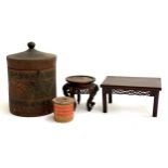 A Chinese miniature hardwood table, 10.5cmH, a carved hardwood bowl stand, Japanese treen game, rice