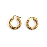 A pair of 9ct gold hoop earrings, approx. 1.3g