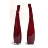 A pair of tapering glass vases, each 46cmH